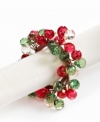 Dress up simple linens for a seasonal bash with napkin rings strung with sparkling beads. Shades of red and green complete a memorable holiday table.