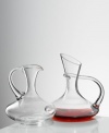 This chic decanter (shown right) treats every wine to the latest advances in breathable barware. An elegantly curved handle allows for a smooth pour, while Eisch's trademarked No Drop Effect© keeps wine from dripping outside the decanter. Holds 50 oz. (Clearance)