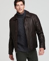 In a heavy leather that keeps in warmth, this Cole Haan moto jacket mixes edge with practicality.