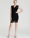 This LBD from Aqua features a lacy texture and curve-hugging fit worthy of hot dates and high school reunions.