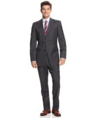 A cool classic. This suit from Tommy Hilfiger has a crisp charcoal stripe and a modern slim fit that takes your dress-up look to the next level.