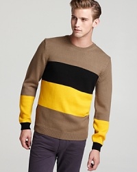 A crafty design from MARC BY MARC JACOBS sets your look off and running with a bright middle stripe surrounded by classic earth tones. Crafted in soft merino wool for maximum comfort.