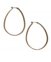 Instantly transform a dull ensemble with head-turning hoops. Lucky Brand design features an oblong-shaped hoop in gold tone mixed metal. Approximate diameter: 1-3/4 inches.