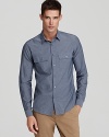 Inspired by a classic military design, this double-pocket button-down rounds out your wardrobe with a little edge.