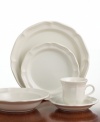 A gently scalloped edge in hardy stoneware gives the Mikasa French Country dinnerware set an effortless grace that's ideal for every day. Oversized plates, bowls and serving pieces are finished with a rich, creamy glaze to suit any setting.