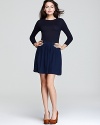 Shoshanna teams a sweater knit bodice with a gathered skirt on this fall-ready, long sleeve dress. An exposed zipper at the back lends a hint a edge.