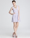 From the demure silhouette to the pastel hue, this Shoshanna dress is ready for all your spring-season soirees.