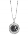 A classic combination. Black (1/4 ct. t.w.) and white (1/4 ct. t.w.) diamonds come together for a stunning effect in this pendant suspended from a sterling silver necklace. Approximate length: 18 inches. Approximate drop: 3/4 inch.