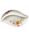 Prolong spring with the lively Mariefleur serving platter. Splashy colors adorn premium porcelain divided in two sections and crafted in a whimsical leaf shape. Mix and match with New Cottage dinnerware, also by Villeroy & Boch.