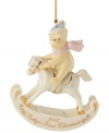 Commemorate a child's first Christmas with this lovable Winnie the Pooh ornament. Disney's sweetest baby bear rides a rocking horse in muted pastel hues with gold accents and the holiday year: 2012.