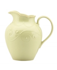 With fanciful beading and a feminine edge, this Lenox French Perle pitcher has an irresistibly old-fashioned sensibility. Hardwearing stoneware is dishwasher safe and, in a soft pistachio hue with antiqued trim, a graceful addition to everyday dining.