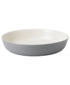 Effortlessly chic, this shallow Simplicity bowl by Vera Wang Wedgwood features a modern silhouette dressed in a neutral cream and gray palette.