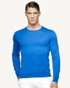 A jersey-knit crewneck is crafted from soft cotton and expertly tailored for a sleek, sophisticated silhouette.