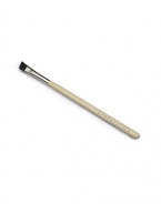 A small, soft angled brush to shape eyebrows, made of boar bristle. 