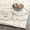 Safavieh Florida Shag Collection SG455-1113 Cream and Beige Shag Area Rug, 5-Feet 3-Inch by 7-Feet 6-Inch