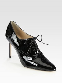 Critically acclaimed patent leather oxford, rejuvenated by a signature point toe and skinny heel. Stacked heel, 3½ (90mm)Patent leather upperLeather lining and solePadded insoleMade in ItalyOUR FIT MODEL RECOMMENDS ordering one size up as this style runs small. 