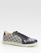 Lace-up sneaker with signature GG plus fabric and crocodile trim.Rubber soleMade in Italy