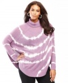 Dramatically increase your style quotient with INC's tie-dyed turtleneck poncho. Angora adds touchable softness to this plus size sweater.