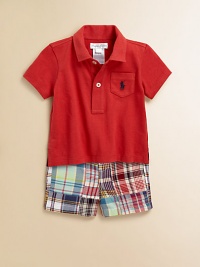 Sure to be a go-to essential, this timeless set pairs a classic cotton jersey polo with a preppy patchwork short and grosgrain belt. Shirt Pointed collarShort sleevesButton-frontEven vented hem Shorts Button closureRear elasticized waistband with belt loopsSewn flySide slant pocketsButtoned back welt pocketCottonMachine washImported Please note: Number of buttons may vary depending on size ordered. 