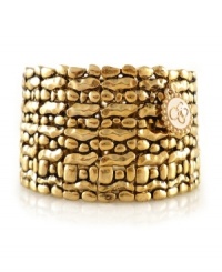 Express yourself with fabulous style. This bold, statement-making cuff by Jessica Simpson features a unique patterned surface crafted in antique gold tone mixed metal. Bracelet stretches to fit wrist. Approximate diameter: 2-1/4 inches.