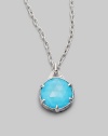 From the Eclipse Collection. A vividly colored, richly faceted turquoise sits in a sterling silver pronged setting with a graceful fluted texture and accents of sparkling white sapphire. Turquoise White sapphire Sterling silver Chain length, about 17 Pendant diameter, about ¾ Lobster clasp Imported