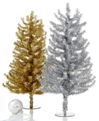 Break out the silver. A polished table topper in shimmering tinsel, this Kurt Adler Christmas tree inspires endless holiday cheer and never leaves a mess.