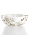 A muted palette tones down the busy florals that adorn this Song Meadow vegetable bowl that, in dishwasher- and microwave-safe porcelain, will make busy cooks sing. Complements Martha Stewart Collection dinnerware.