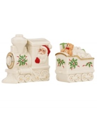 Conduct a festive meal with salt and pepper shakers featuring Santa at the helm of a Holiday train. With gold accents and a holly motif to match the beloved Lenox dinnerware pattern.