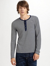 Seriously soft wool/cashmere pullover with timeless stripes a henley placket and lots of preppy appeal.Crew neckline Four button placket Long sleeves 70% superfine wool/30% cashmere Dry clean Imported