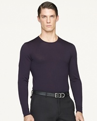 A handsome crewneck sweater is constructed from smooth Italian wool and fine-tailored for a trim silhouette.