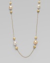 From the Africa Pearl Collection. A delicate link chain with 18k gold and cultured freshwater pearl stations for a look that's both feminine and unique. 18k goldRound white and champagne cultured freshwater pearlsLobster clasp closureLength, about 36Made in Italy