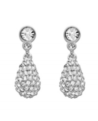 Make a statement worthy of the red carpet. Swarovski's sparkling teardrop earrings are embellished in clear crystal pavé and dangle from an elegant pair of silver tone mixed metal earrings. Approximate drop: 3/4 inch.