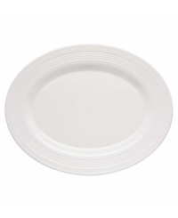 Find style and substance in the Tin Can Alley oval platter. Concentric grooves give the Lenox dinnerware its edge in versatile white bone china.