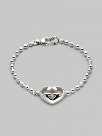 From the Love Britt Collection. Signature interlocking G in an iconic heart shape accents the wrist beautifully. Sterling silver Width of heart, about ¾ Length, about 6½ Lobster clasp closure Made in Italy 