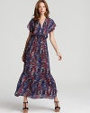 Imbued with a vibrant print, this Dolce Vita maxi dress is flourished with a ruffle at the hem for a feminine finish.