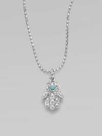 The open hand, a traditional symbol of protection, set with pavé diamonds and a vibrant turquoise center on a 14k white gold ball chain.Diamonds, 0.06 tcw 14k yellow gold Chain length, about 16 Pendant length, about ½ Lobster clasp Imported