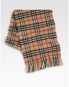 Iconic plaid design enhances this luxurious winter staple.Fringed edgesAbout 13W x 61LCashmereDry cleanImported