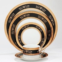 The Orsay Black/Gold cake plates by Philippe Deshoulieres features a delicate gold pattern set against a black background that subtly references Limoges. Inspired by the famous 19th century Parisian train station on the banks of the Seine, this collection is sure to add old world romance to your table setting.