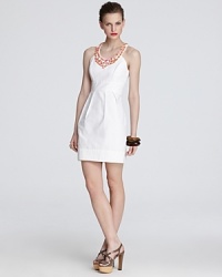 An opulently beaded neckline punctuates this vintage-inspired yet sleekly modern Shoshanna dress.