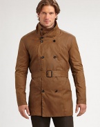 A double-breasted coat with a classic belted look and convenient double back vent.Stand collarBelted styleSlash pocketsDouble back ventAbout 33 from shoulder to hem80% cotton/20% nylonDry cleanMade in USA