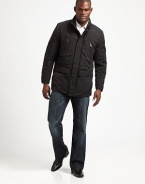 A lightweight, breathable mid-length jacket beats the wintry elements in style with a stand collar, a hidden snap-button placket and an adjustable waist for maximum comfort and support.Zip frontSnap-button placketStand collarZippered chest, waist flap pocketsAbout 31 from shoulder to hemPolyesterDry cleanImportedFur origin: China