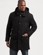 A dynamic outerwear selection to keep you stylishly warm all winter long, this piece exudes masculine cool, crafted in water- resistant wool with a removable hood, down-filled nylon bib and a sleek leather trim.Button-frontRemovable hoodChest welt, waist flap pocketsAbout 34 from shoulder to hemNylon bibDown fill60% wool/22% polyester/8% rayon/6% acrylic/4% nylonDry cleanImported