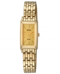 Seiko's classic styling and solar power combine for an exquisite dress watch. Brushed and polished gold tone stainless steel bracelet and rectangular case, 15mm. Champagne dial features stick indices, two gold tone hands and logo. Quartz movement. Water resistant to 30 meters. Three-year limited warranty.