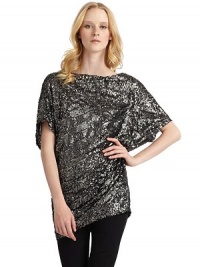 THE LOOKAllover sequinsDolman sleevesBack cutoutPullover styleTHE FITAbout 29 from shoulder to hemTHE MATERIALPolyesterFully linedCARE & ORIGINDry cleanImportedModel shown is 5'10½ (179cm) wearing US size Small. 