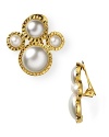 Mod meets modern with this pair of gold-rimmed clip on earrings from Kenneth Jay Lane, boasting a '60's-inspired shape and eye-catching faux pearl cluster.