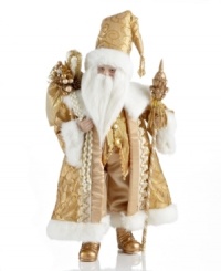 Embrace a whole new side of Santa Claus. At over a foot tall, this elaborate figurine shines in head-to-toe gold from Holiday Lane. Even his staff and sack match for a look of lasting holiday grandeur.