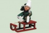 Toddler on Sled Figurine