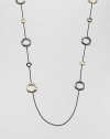 From the Notte Collection. Modern 18k gold and blackened sterling silver circular stations on a delicate link chain. 18k goldBlackened sterling silverLength, about 44Lobster clasp closureImported 