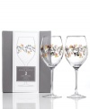 Ready for celebration, this set of Charter Club's Novelty Confetti wine glasses combines a simply beautiful shape with colorful rings and shimmering garland for a look that's fun yet refined. (Clearance)