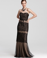 ML Monique Lhuillier creates a classic with this iconic strapless dress, teaming luxe lace with tulle.